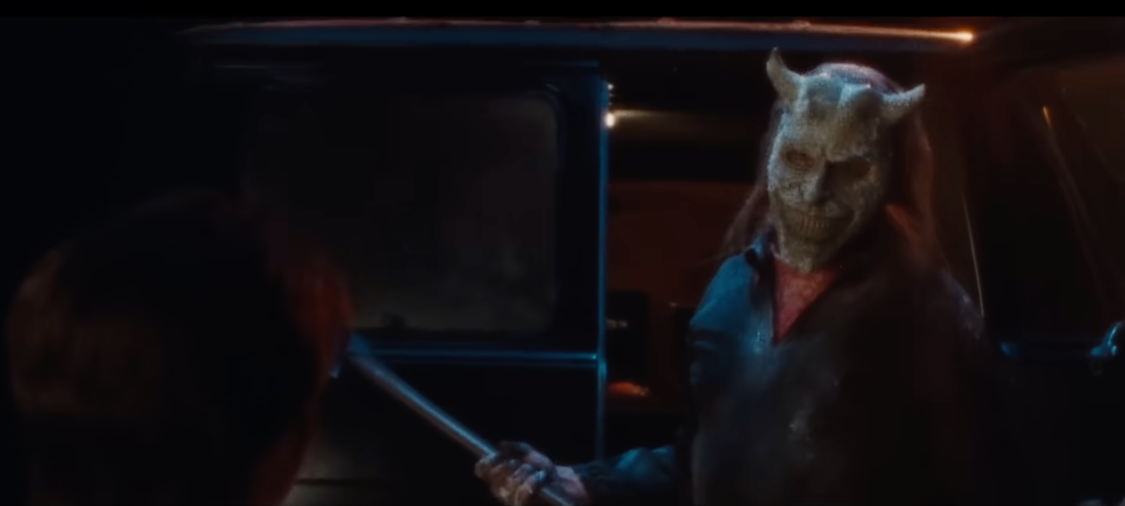 the grabber holding an axe in the black phone 2